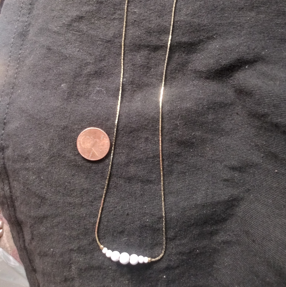 Gold tone necklace